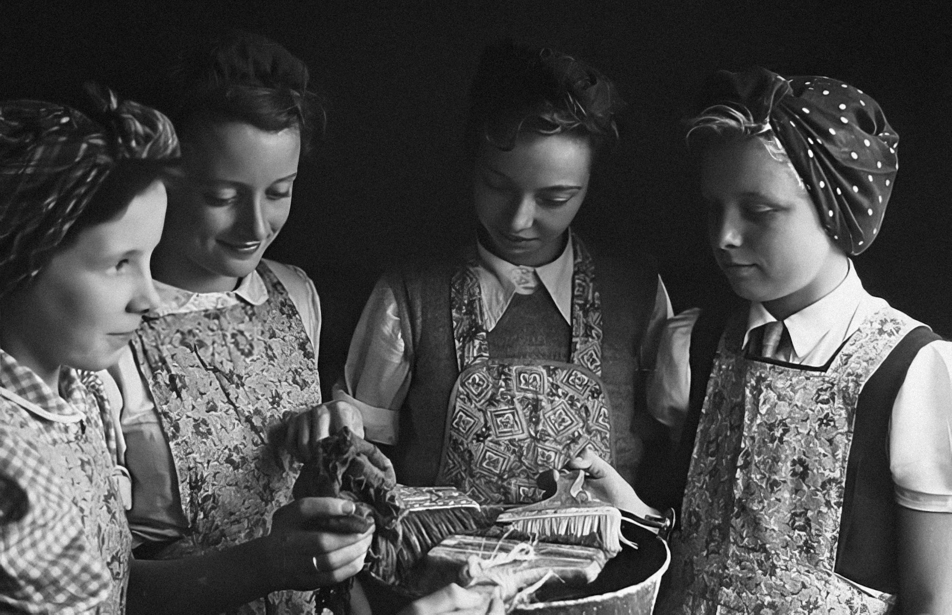 a group of young women standing next to each other